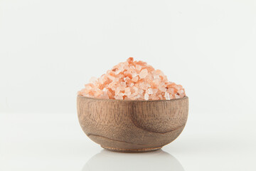 Fototapeta na wymiar Pink salt from the Himalayas; photo on white background.