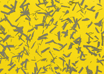 Abstract geometric golden sparkly on yellow paper background. Trendy color of year. Festive holiday backdrop. Birthday congratulations Christmas New Year.
