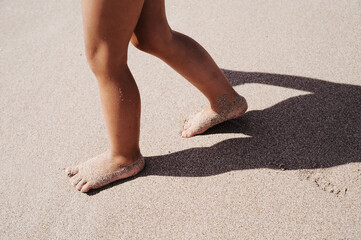 child feet in water