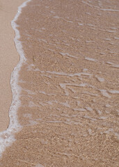 Summer time concept. Sand and clear water