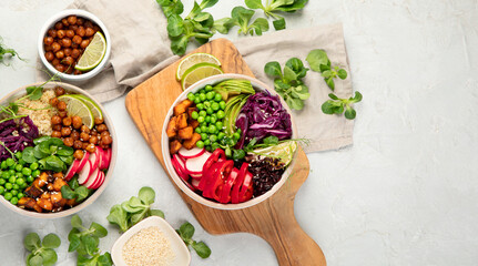 Tasty colorful vegan poke bowl on light gray background.