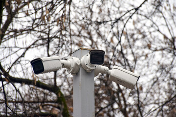 Security system of outdoor video surveillance, CCTV Security Camera on outdoors background.