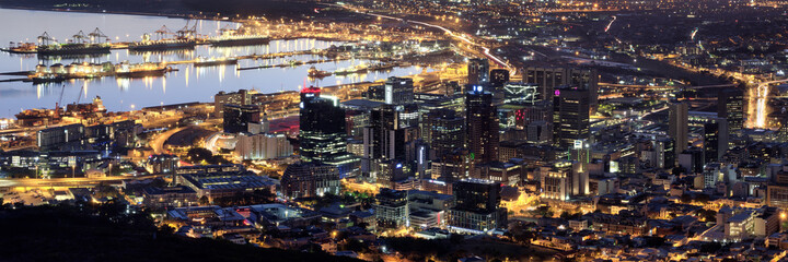 Fototapeta na wymiar Aerial night panoramic of downtown Cape Town, harbor and Table Bay, South Africa.