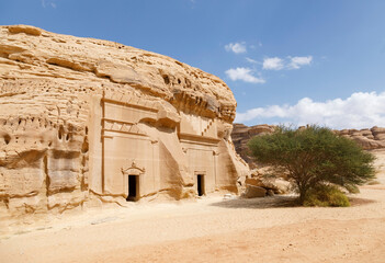 Jabal Al Banat, one of the largest clusters of tombs in Hegra with 29 tombs that have skillfully carved facades on all sides of the sandstone rock, Al Ula, Saudi Arabia - 425548908