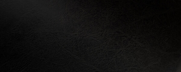 Dark leather textured background. Elegant black abstract wallpaper. 