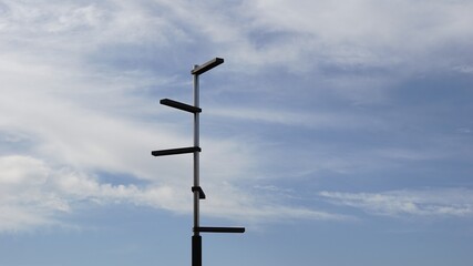 street light against cloud background
