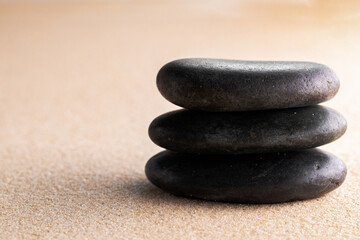 Fototapeta na wymiar Japanese zen garden meditation stone in sand