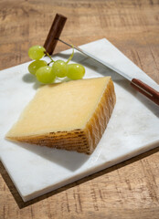 Cheese collection, piece of spanisch hard manchego cheese made in La Mancha region from sheep milk
