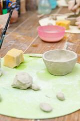 preparing clay for modeling on the table