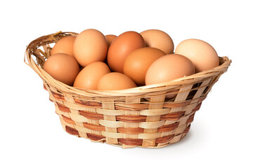 Chicken eggs in basket Isolated on white background. close up