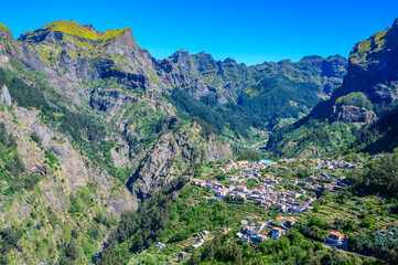 Fototapeta na wymiar View of Curral das Freiras village in the Nuns Valley in beautiful mountain scenery, municipality of Câmara de Lobos, Madeira island, Portugal.