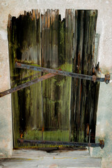 Old door, very old entrance, old crumbling wood.