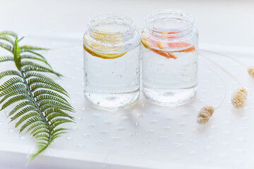 Homemade cocktail. Hard seltzer with grapefruit and lemon. Summer background