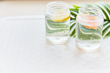 Hard seltzer cocktail with with lemon and grapefruit. Copy space