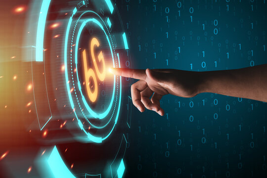 Hand touching to virtual info graphics with 6G technology, 6G is 6 generation of wireless mobile communication system which increases high speed internet for cellphone.