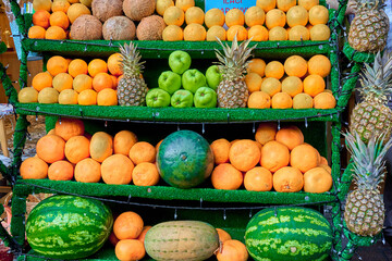 The street counter is a display case with beautifully neatly arranged fruits. Turkish style fruit layout