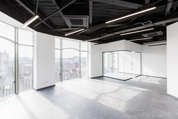 Interior photography, large spacious office center, with panoramic windows and unfurnished glass doors