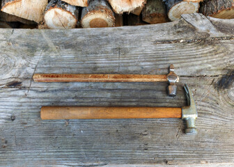 scrap metal from various spare parts, rusty old antique iron hammers, scrap metal