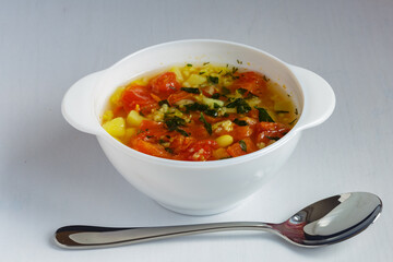 Tomato soup with beans and spices. Delicious vegetarian soup.