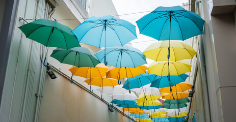 Street decorated with colored umbrellas. view of Umbrella Street.