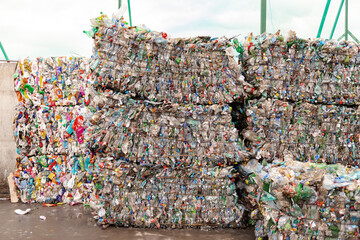 Bales of plastic bottles after the press. Sorting garbage plant in the Moscow region.