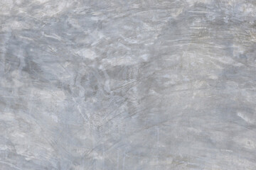 Obraz premium The cement wall shows the pattern of the building's wall and is painted with liquid solution.