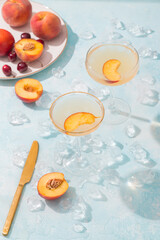 Summer refresh cocktail and fruits for dessert. Alcoholic cocktails