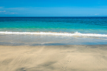Fototapeta na wymiar A White Sand beach (or Virgin Beach) on the southeast on Bali island in Indonesia on a sunny day