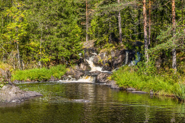 Ruskeala waterfalls in Russian Karelia on a sunny day