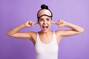 Photo portrait of angry girl shut ears with fingers screaming ignoring irritated isolated on pastel...