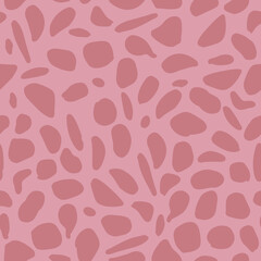 Seamless giraffe pattern on pink background. Abstract animal template.