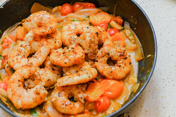 Marinated organic shrimp scampi dish 