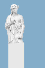 Fototapeta na wymiar Kyiv, Ukraine â€“ May 3, 2020: Dante Alighieri - white statue on the blue background.
