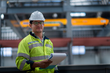 worker in factory. Engineer standing in depot  and railway inspection. construction worker on railways. Engineer work on railway. rail, engineer, Infrastructure