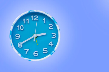 watch with a blue dial on a blue background