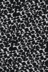 
close up of abstract black white pattern on fabric