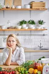 Obraz na płótnie Canvas Concept of diet. healthy young woman doubting and confused, worried about something in kitchen