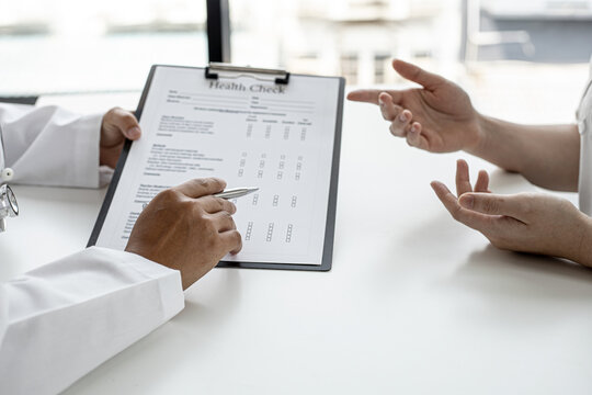 The Doctor And The Patient Are Discussing The Details Of The Treatment, The Results Of The Physical Examination Of The Patient. Annual Physical Examination Concept.