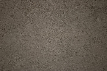 A gray cement wall. Gray background.