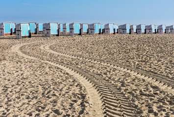 Deserted beach, locked beach chairs in Warnemuende near Rostock on the Baltic Sea, Germany - 425590384