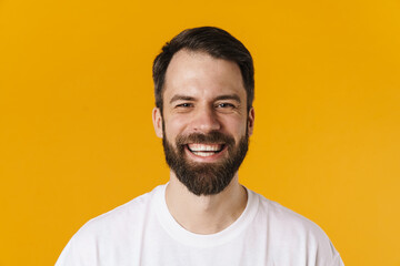 Portrait of a happy brunette bearded man