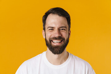 Obraz premium Portrait of a happy brunette bearded man