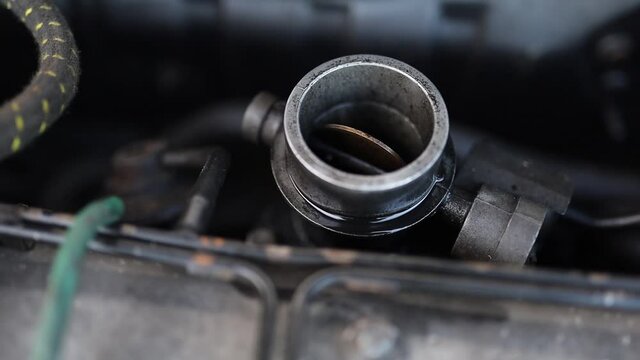 dirty throttle valve of the car engine.