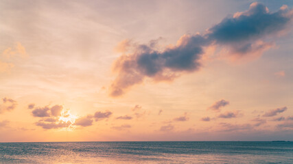 Fototapeta na wymiar sunset sky over the sea in the evening