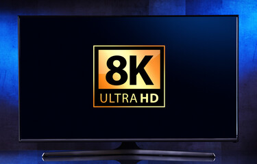 A flat-screen TV set displaying a 8K Ultra HD icon
