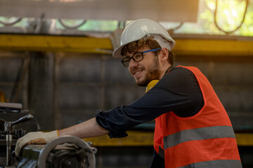 Industrial worker wearing safety inspection and checking production process in factory, Industry, Engineer,Construction concept.