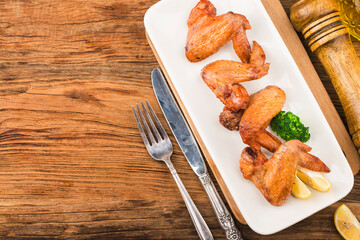 A plate of freshly baked chicken wings