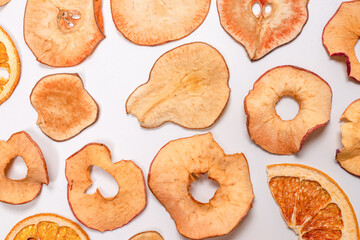 Dried fruit isolated on white background. Dried grapefruit, dried apple, dried pear.
