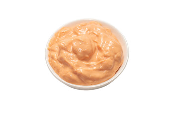 Sauce in a bowl isolated on white.