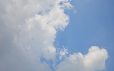Blue sky with a cloud.